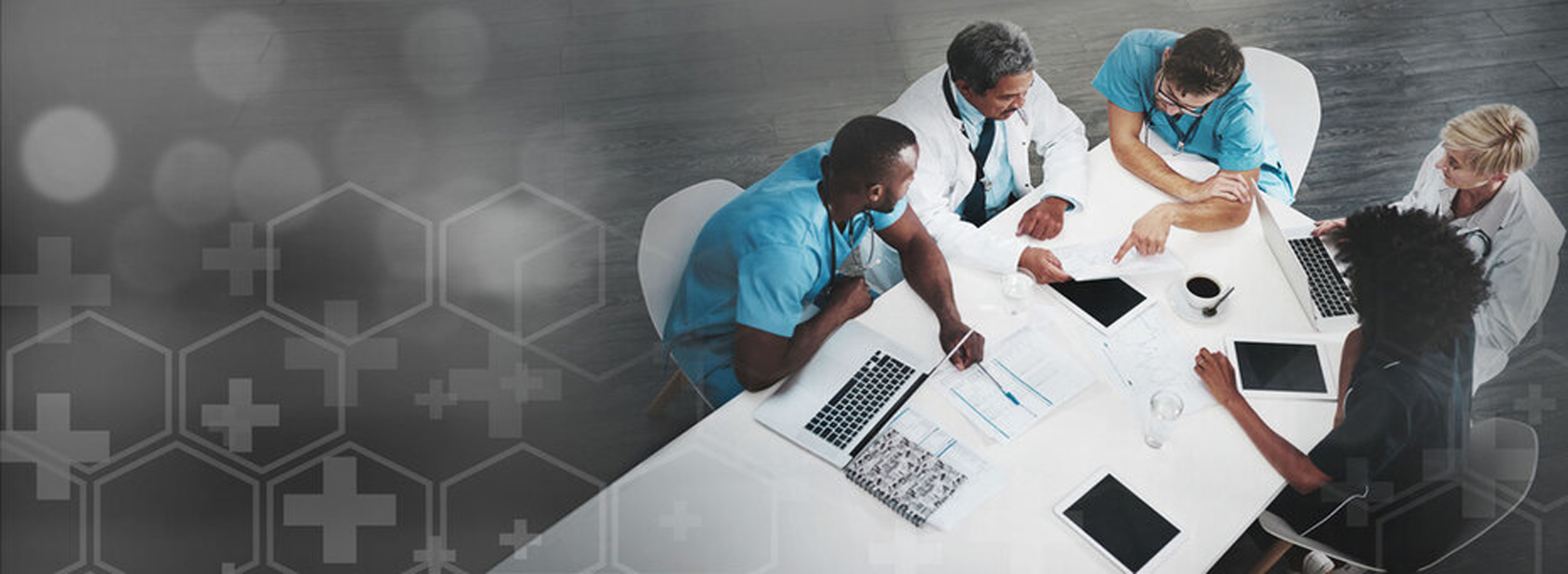 Healthcare professionals reviewing a chart together